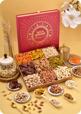 Assorted Dry Fruits Gift Pack including cashews, almonds, raisins, dates, pistachios, walnuts, roasted cashews, apricots, penuts