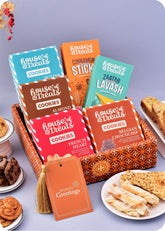 Cookies, Snacks Hamper Gift Box including french heart cookies, belgian chocochip cookies, almond biscotti cookies, butter cashew cookies and cinnamon sticks snacks, spiced lavash snacks.