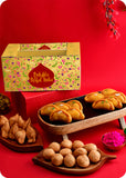 A Holi gift pack containing Shahi Gujiya, Kachori, Samosa and herbal gulal.