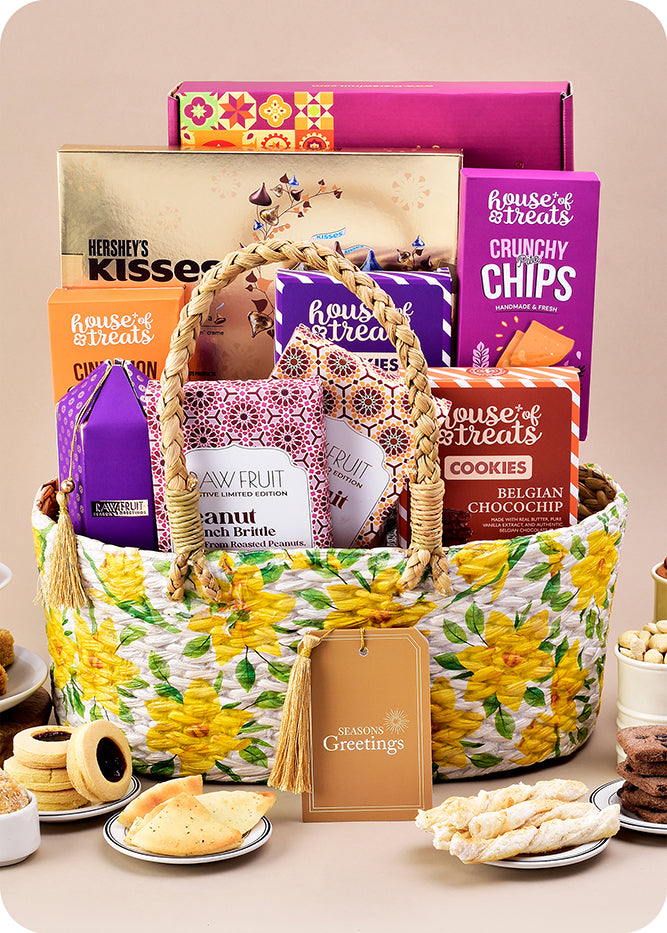 Delicious Assortment: Sweets, Chocolate, Cookies & Premium Nuts including kaju katli, milk cake, kisses chocolate pack of 3, blueberry jam cookies, belgian chocochip cookies, pita chips, cinnamon sticks, dry fruit nutty brittle, peanut crush brittle, cashews and almonds