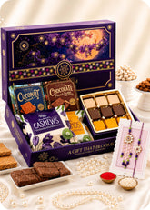 Celebration Hamper Dry Fruits, Brittles & Sweets with Bhaiya Bhabhi Rakhi Set