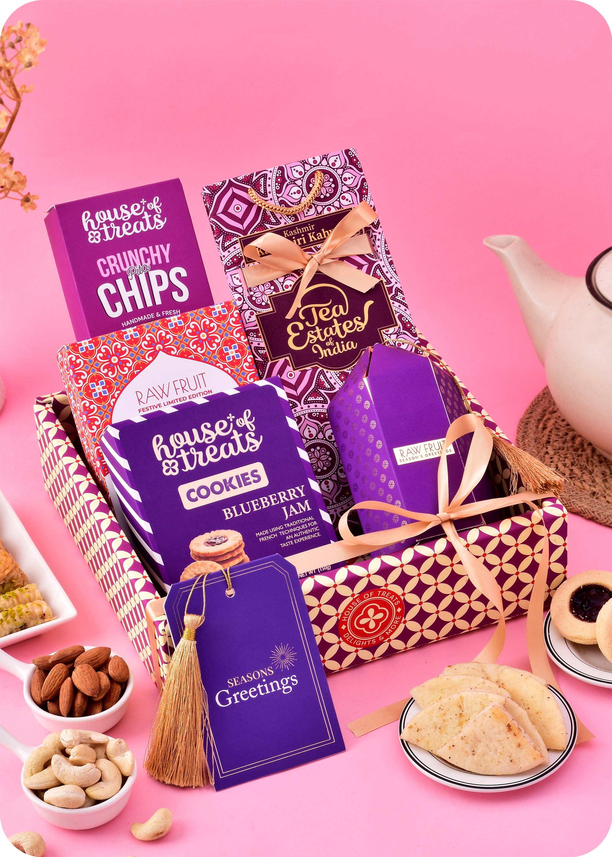 Dry Fruits, Cookies & Snacks with Tea Gift Hamper including blueberry jam cookies, baklawa, pita chips snacks, kashmiri kahwa tea, cashews and almonds