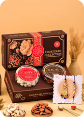 Dry Fruits Box With Bhaiya Bhabhi Rakhi Set including Cashews and Almonds.