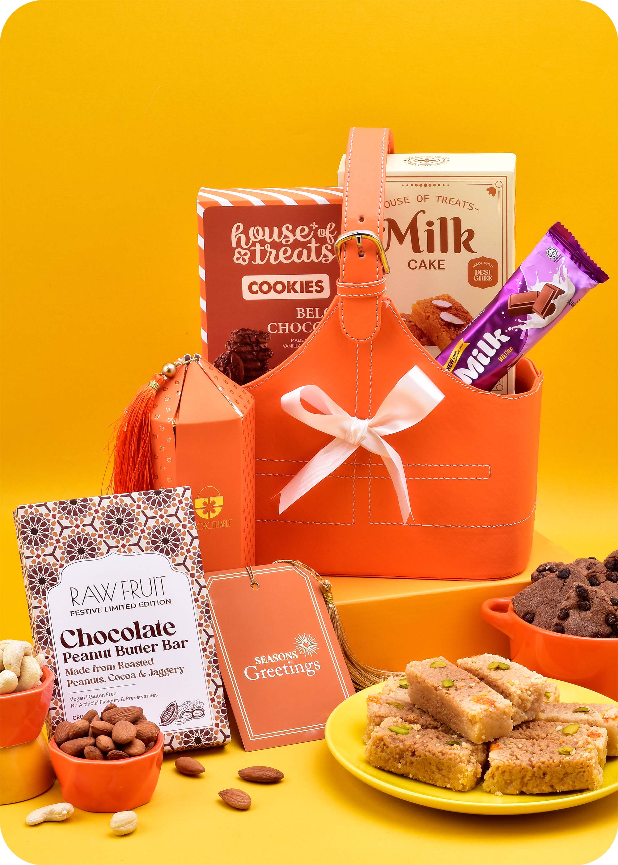 Gift Hamper: Snacks, Brittle with Sweets including milk cake, belgian chocochip cookies, chocolate peanut butter bar, milk chocolate, cashews and almonds