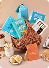Premium Gift Basket: Fragrances, Sweets, Nuts including kaju katli, butter cashew cookies, lavash snacks, bellavita perfume, cashews and almonds
