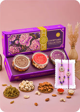 Rakhi Gift Box: DryFruits with Bhaiya Bhabhi Rakhi Set including Cashews, Almonds and Raisins.