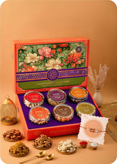 Rakhi Gifts: Dry Fruits with Rakhi including Cashews, Almonds, Raisins, Walnuts, Pistachios & Dates.
