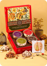 Rakshabandhan Gift Box: Dry Fruits with Bhaiya Bhabhi Rakhi Set including Cashews, Almonds, Raisins and Pistachios.