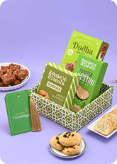 Sweets with Cookies Gift Hamper including dodha barfi, dates & honey cookies, garlic crostini snacks