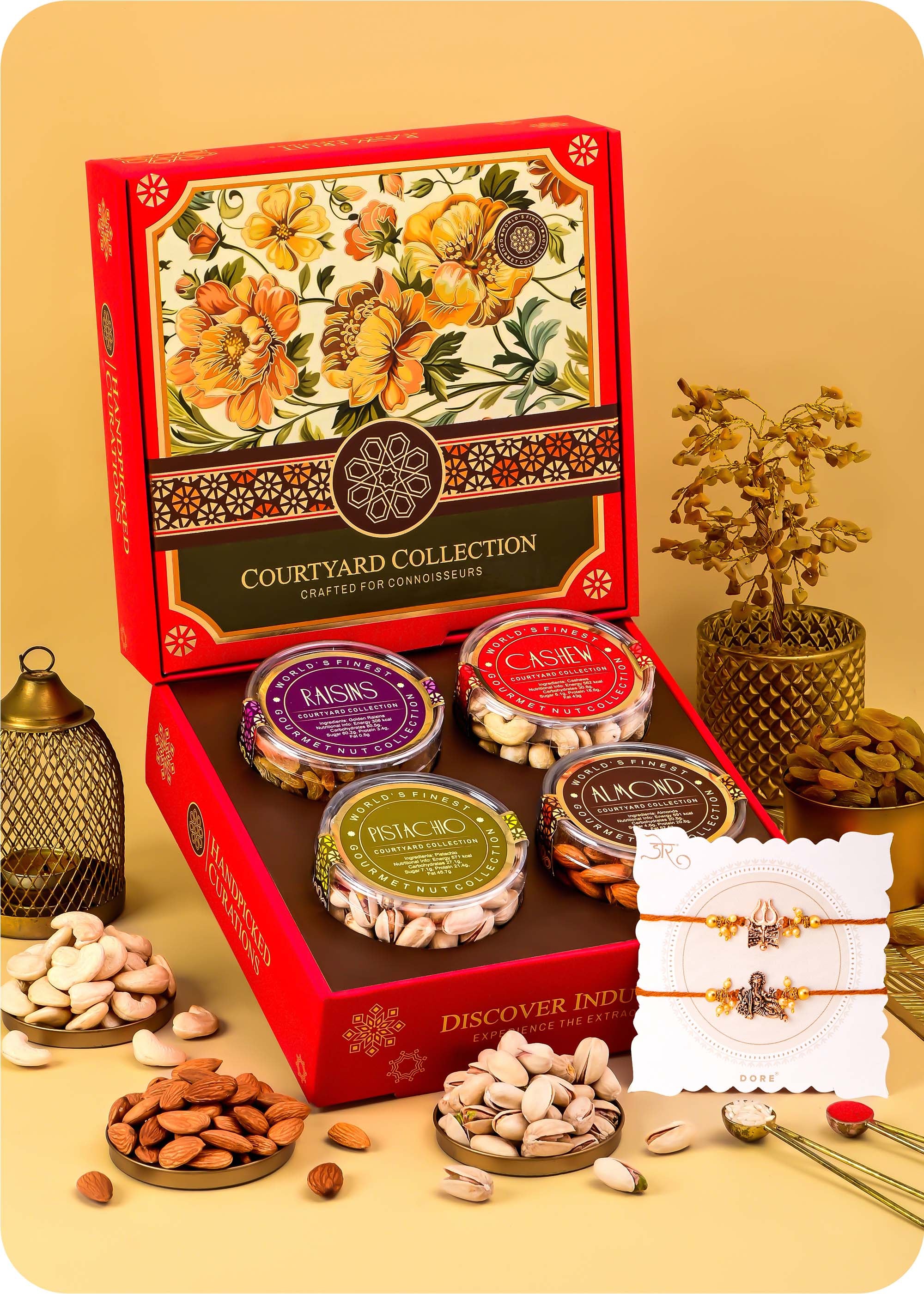 Courtyard Collection - 495 Grams Set of 4 Dry Fruits with Set of 2 Rakhi cashews, almonds, raisins and pistachios.
