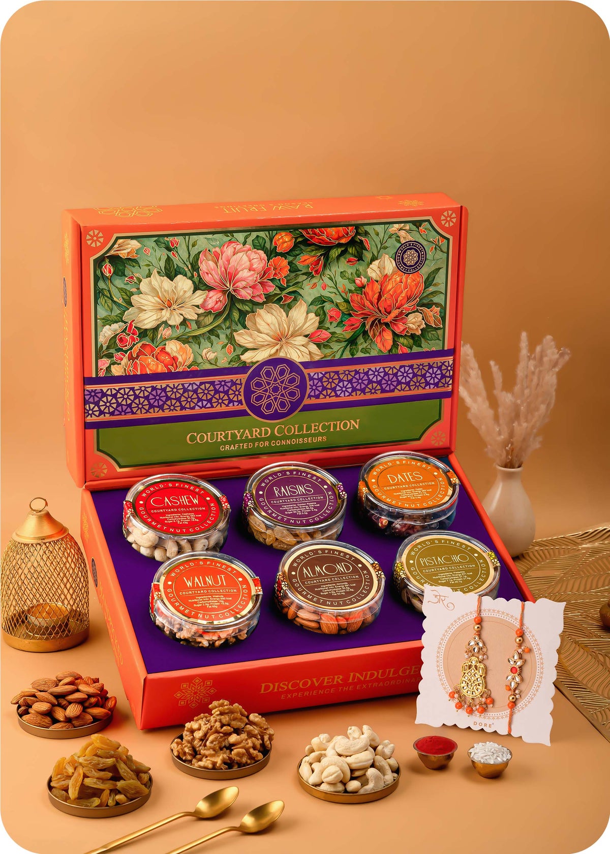 Courtyard Collection - 745 Grams Set of 6 Dry Fruits with Set of 3 Rakhi including cashews, almonds, raisins, pistachios, walnuts and dates.