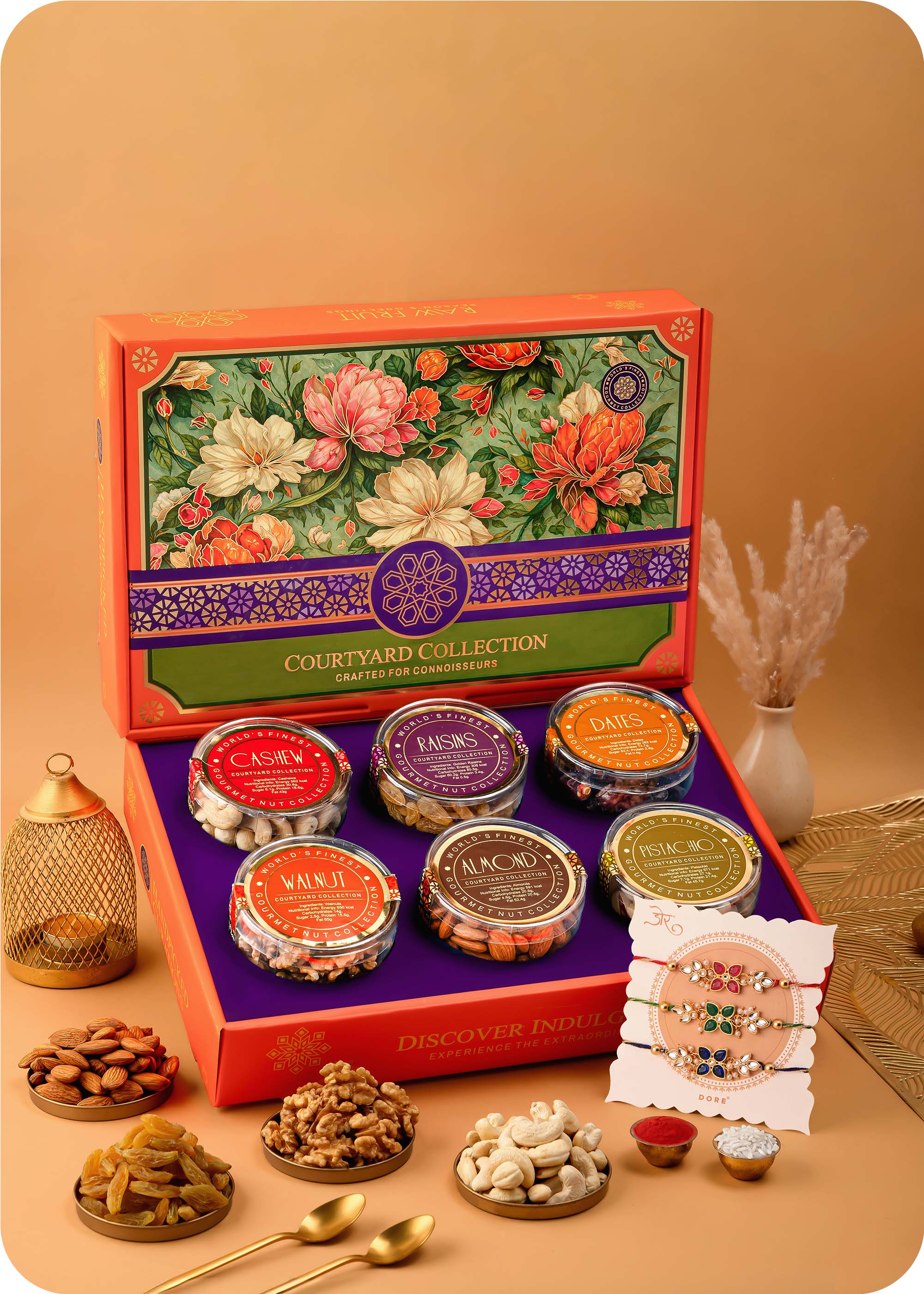 Courtyard Collection - 745 Grams Set of 6 Dry Fruits with Set of 3 Rakhi including cashews, almonds, raisins, pistachios, walnuts and dates.