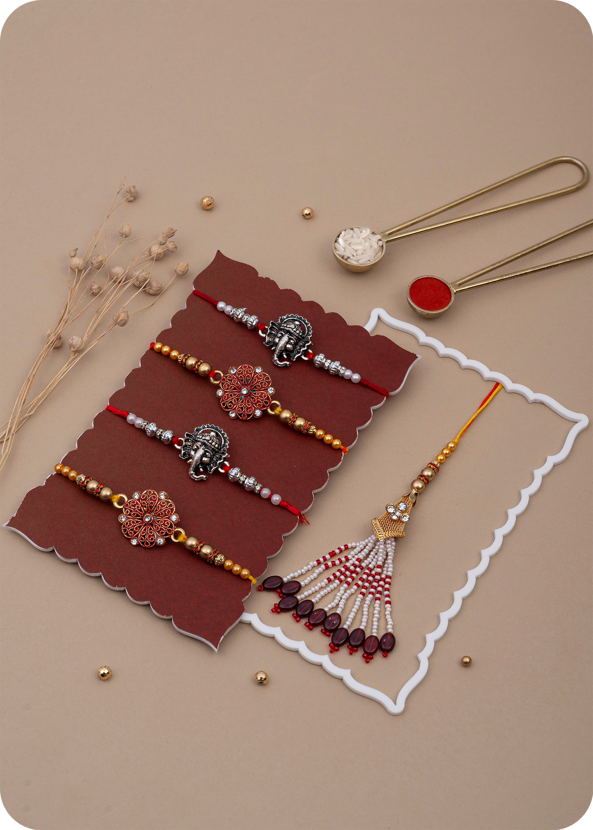Sweet Celebrations: Kaju Katli with Set of 5 Rakhi