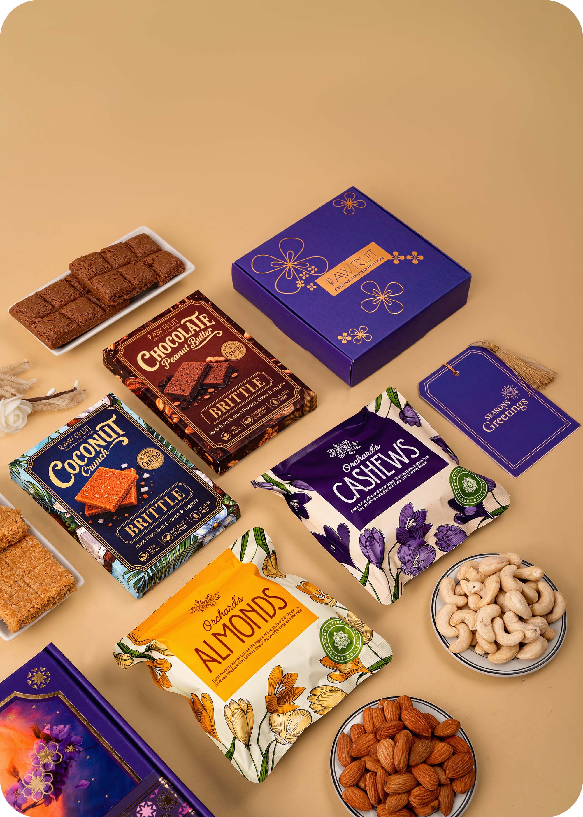 Celebration Hamper Dry Fruits, Brittles & Sweets with Set of 3 Rakhi