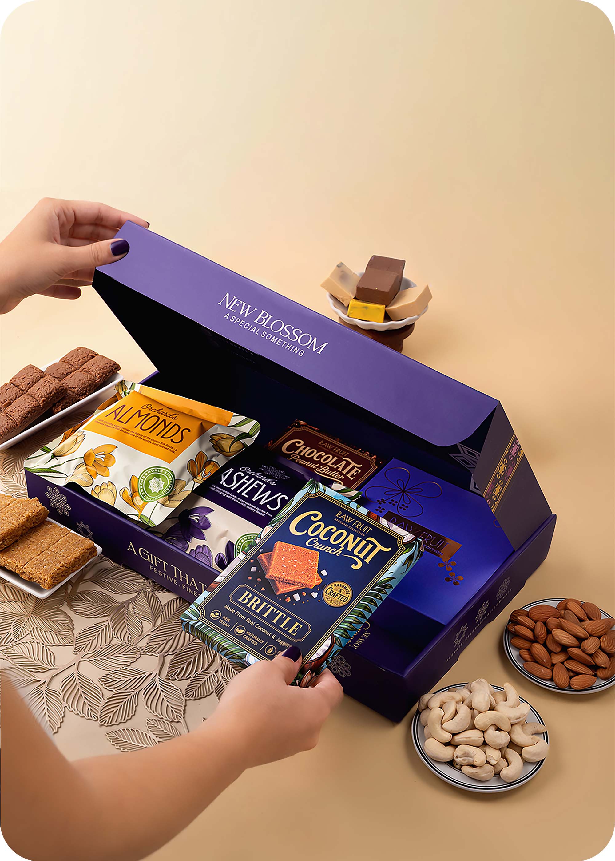 Celebration Hamper Dry Fruits, Brittles & Sweets with Set of 3 Rakhi