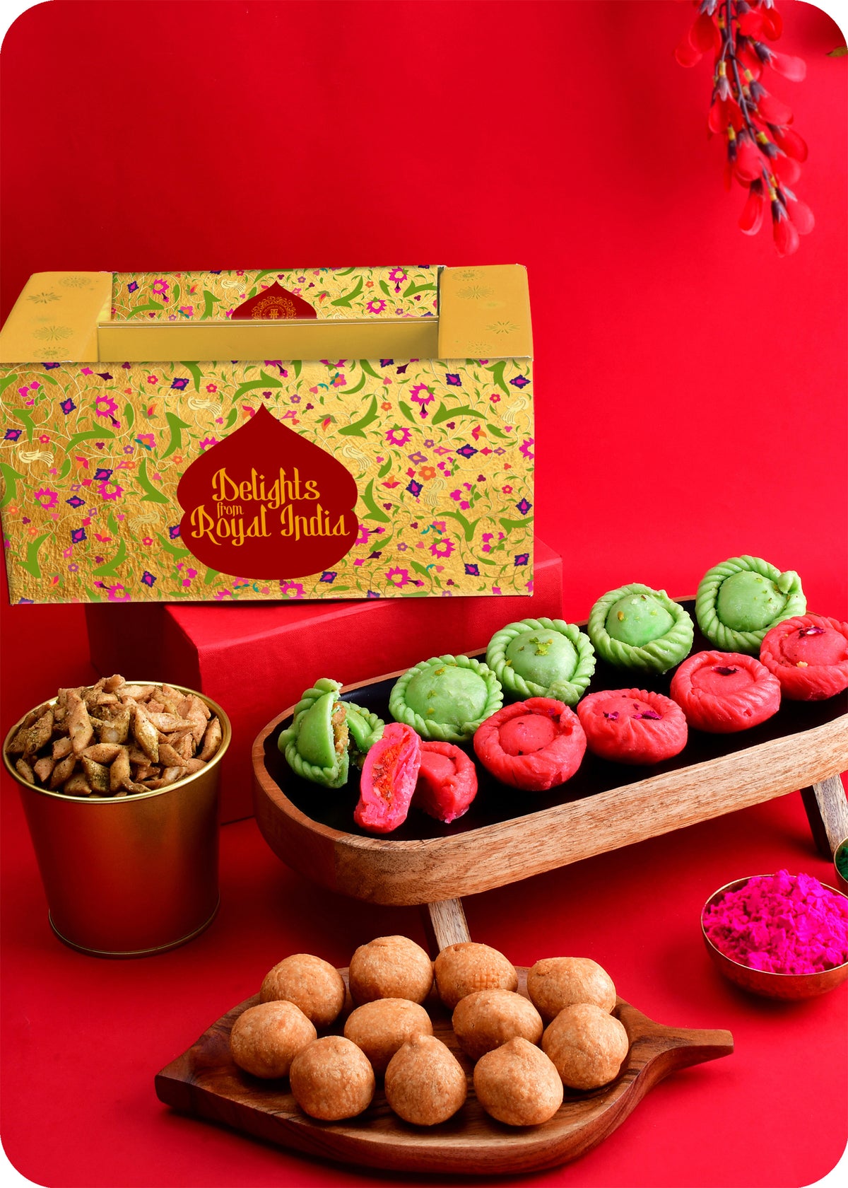 Holi gift pack for festive celebrations including rose chandrakala, pista chandrakala, kachori, pudhina paree and herbal gulal.