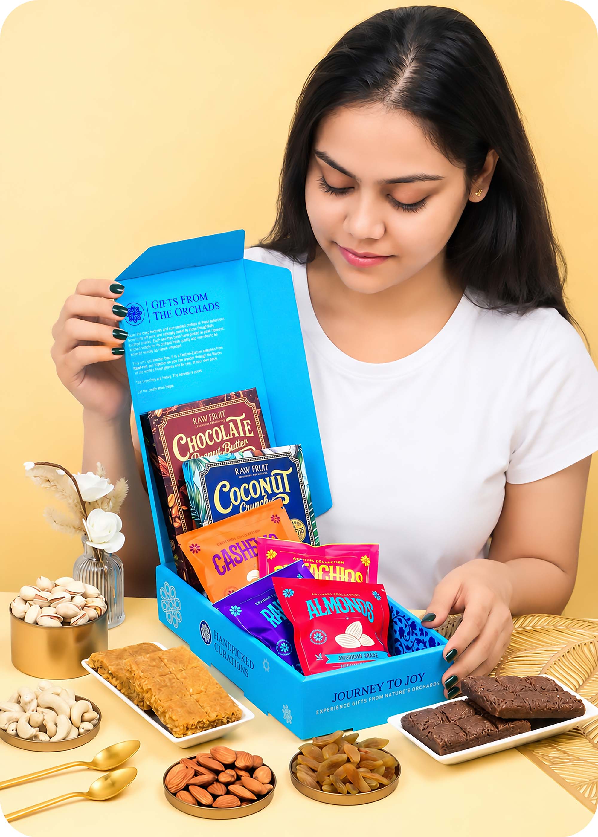 Gifts From The Orchards Dry Fruits & Brittles Gift Pack with Set of 2 Rakhi