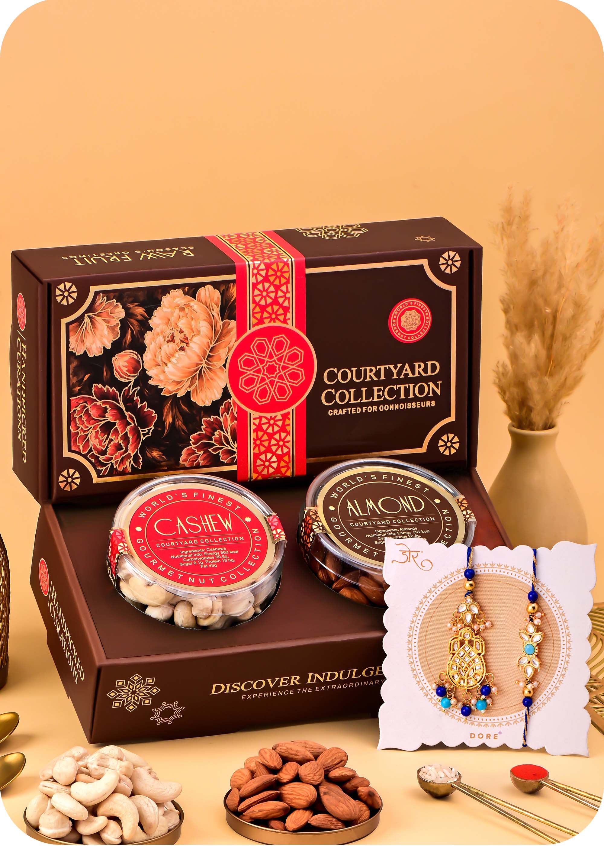 Dry Fruits Box With Bhaiya Bhabhi Rakhi Set including Cashews and Almonds.