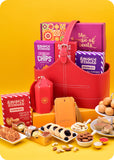 Gift Hamper: Snacks, Cookies with Sweets including kaju katli, samosa, pita chips, pizza mini, blueberry jam cookies, french hearts cokkies, ferrero rocher chocolate pack of 4 and cashews, almonds