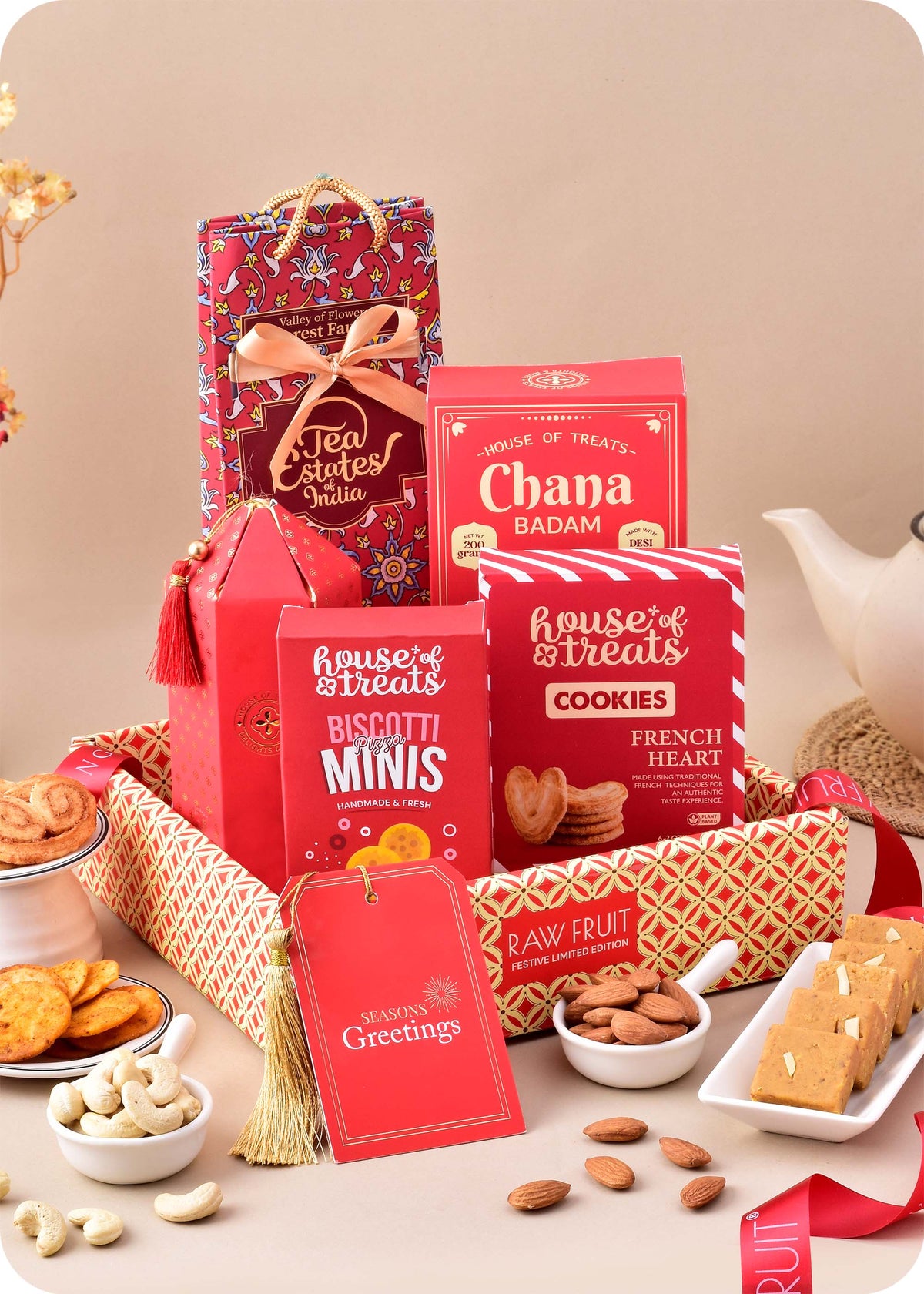 Sweets, Cookies & Snacks with Dry Fruits Gift Hamper including chana badam barfi, french heart cookies, pizza mini snacks, forest fauna tea, cashews and almonds